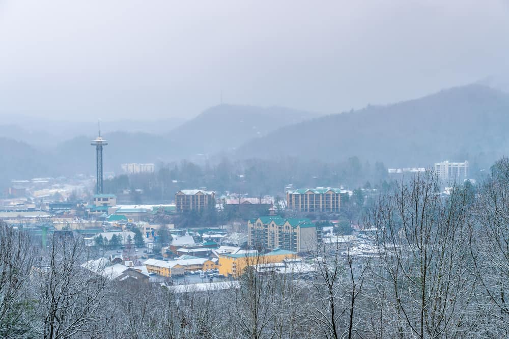 winter in the smoky mountains- aerial view of snowy gatlinburg